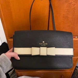 Kate spade, black with white bow side bag.